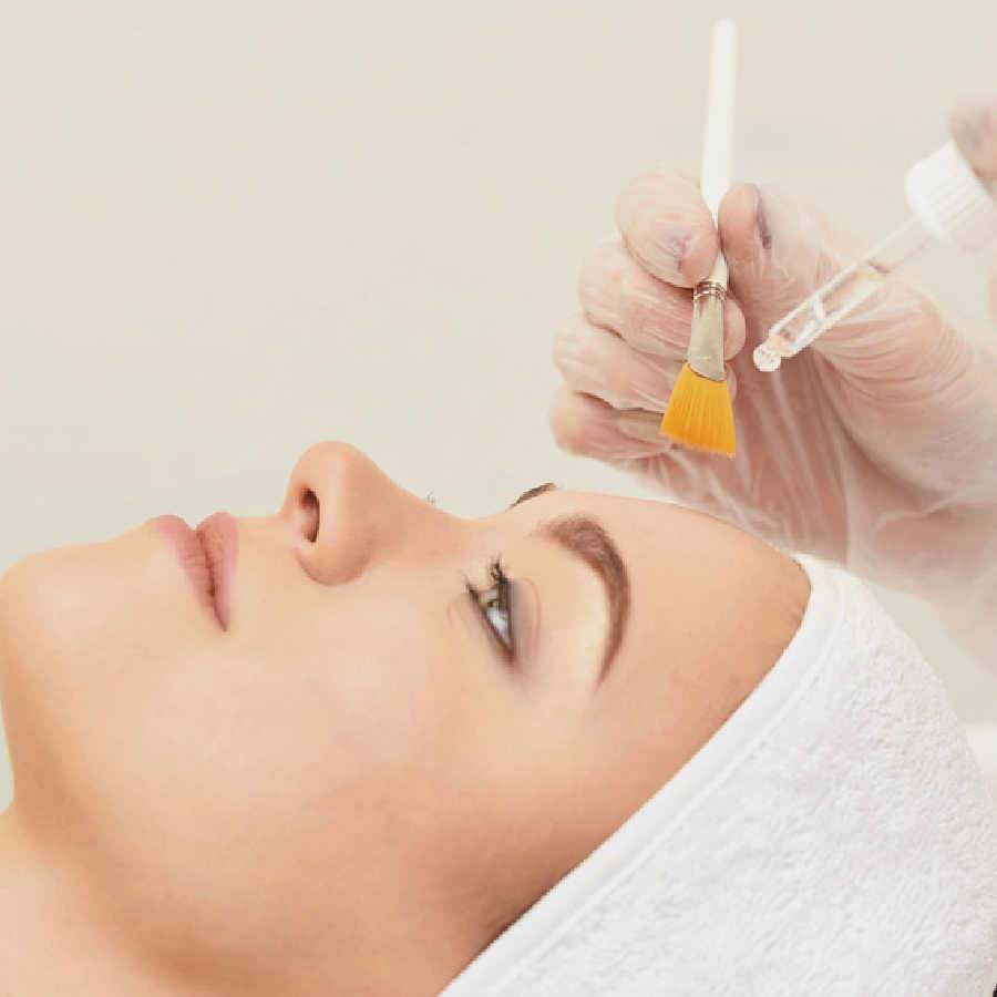 Shows Facial Peel Being Performed On A Patient